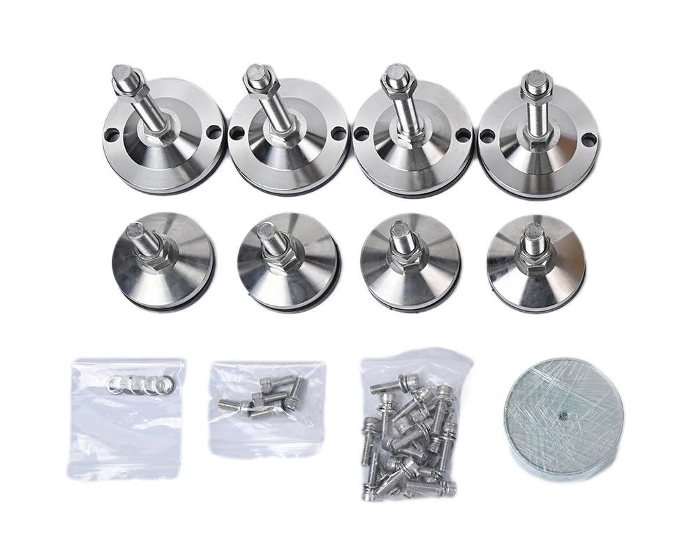 Set of wheels, cup pads, and screws for embroidery machine maintenance.